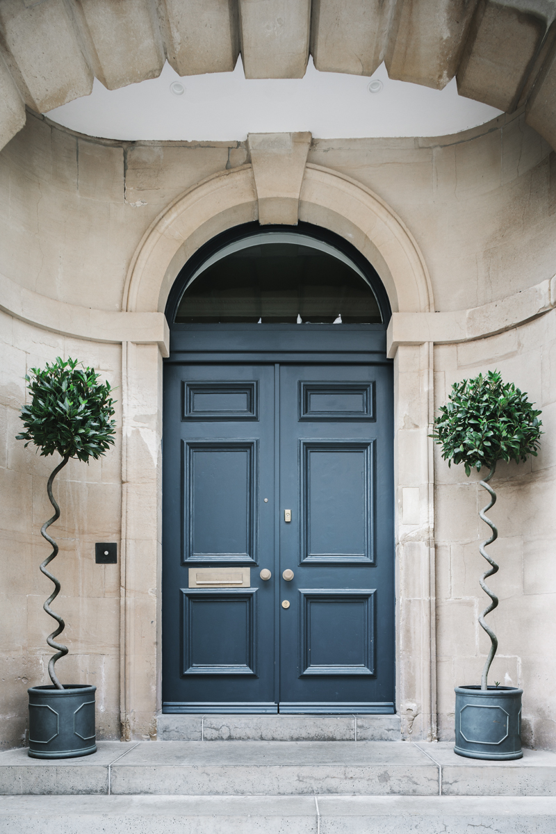 Double front doors with semi-circular fanlight