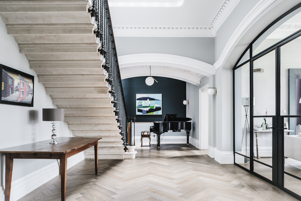 Grand hallway with ornate stone stair