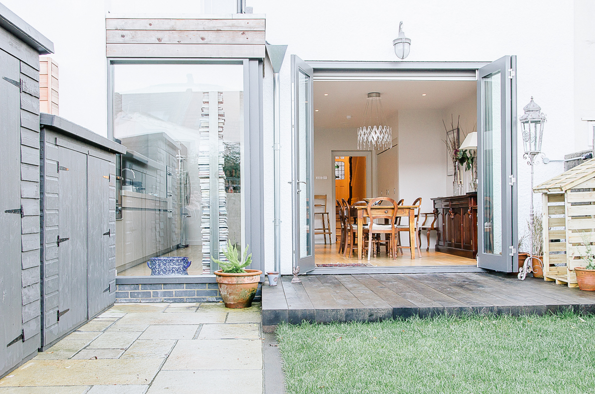 Bifold doors onto timber sleeper terrace