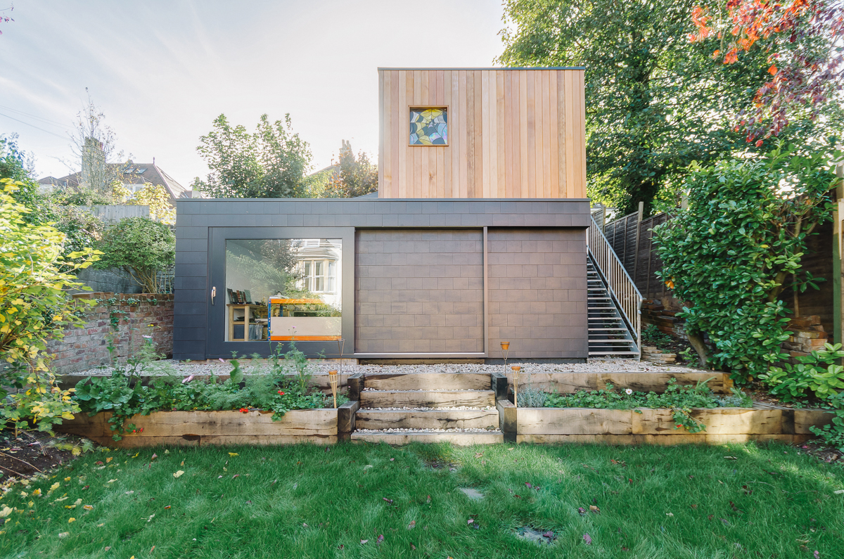 Two storey garden studio and garage