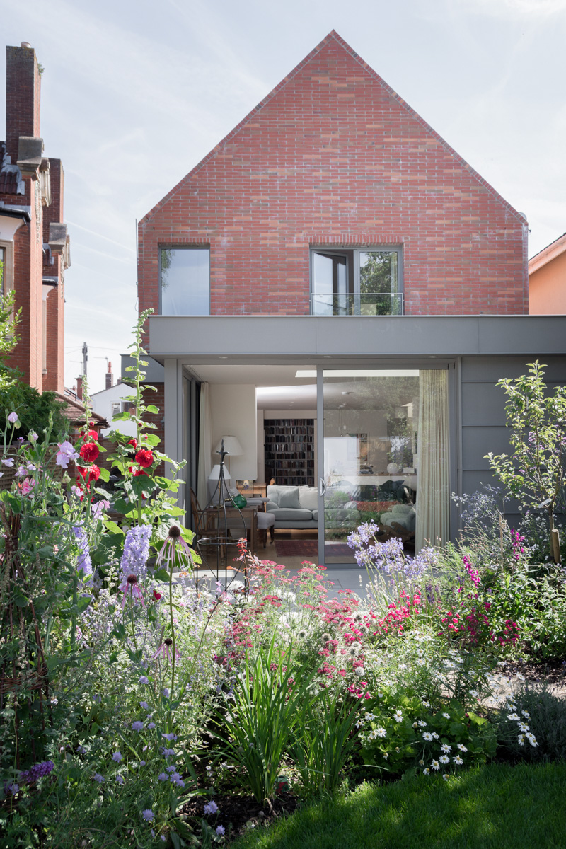 Contemporary pitched roof brick house