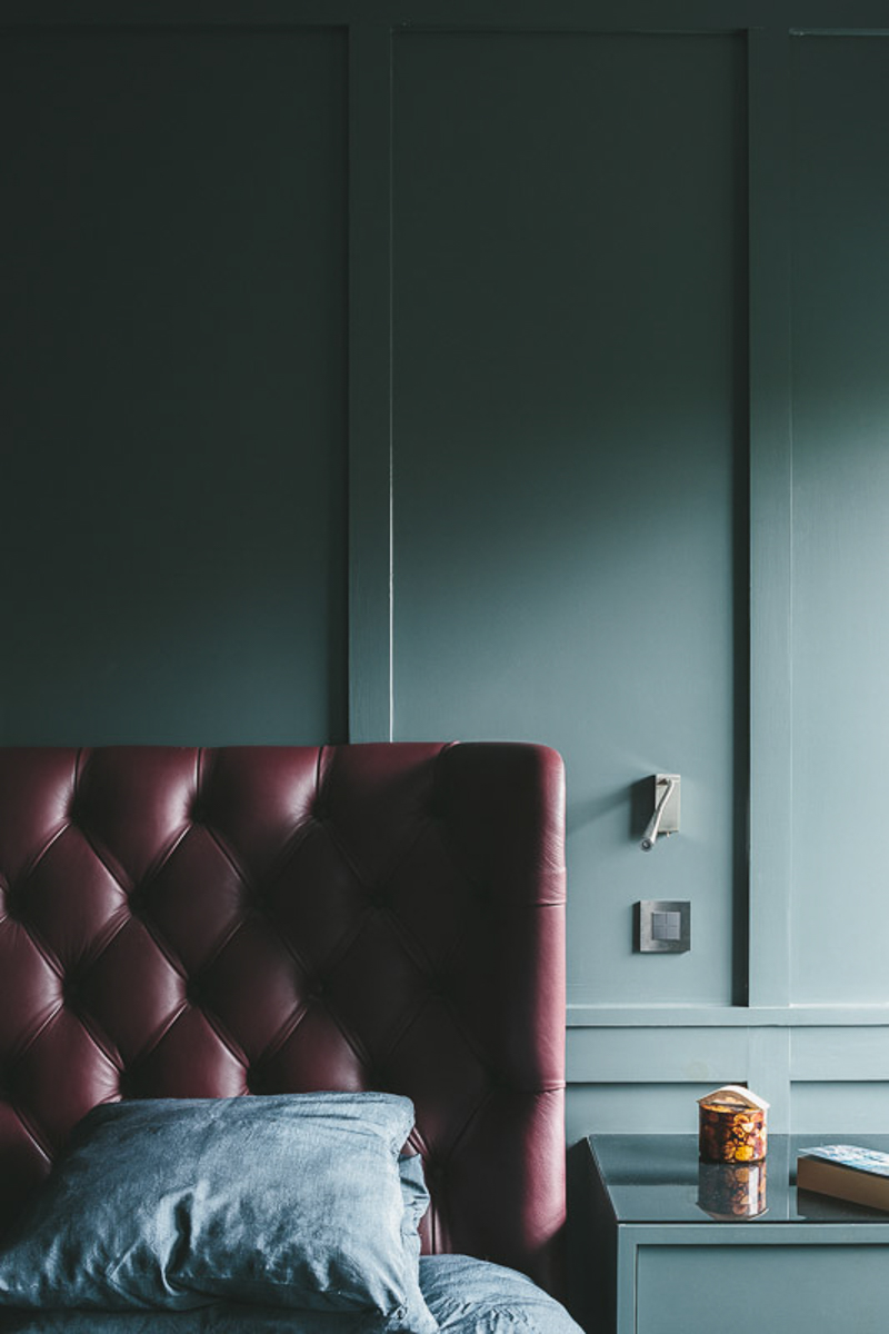 Dark bedroom panelling and headboard