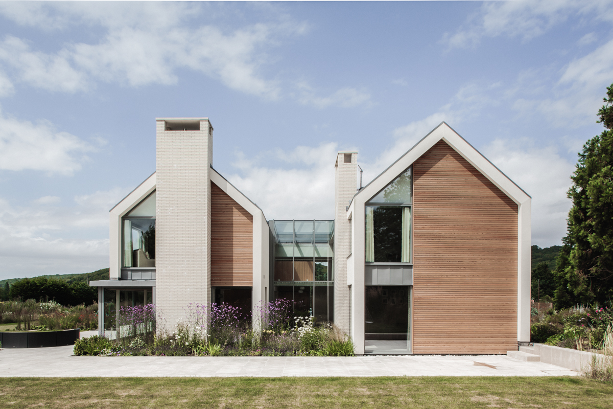 Modern new build house with two pitched roofs