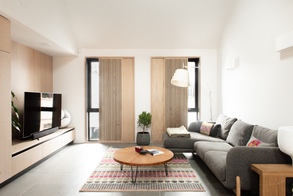 Modern vaulted living room with timber joinery