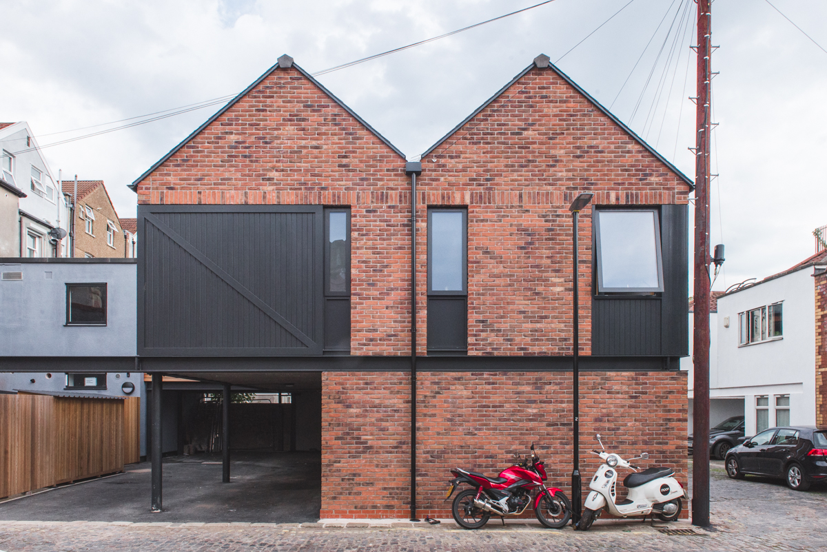 Modern brick mews house with undercroft