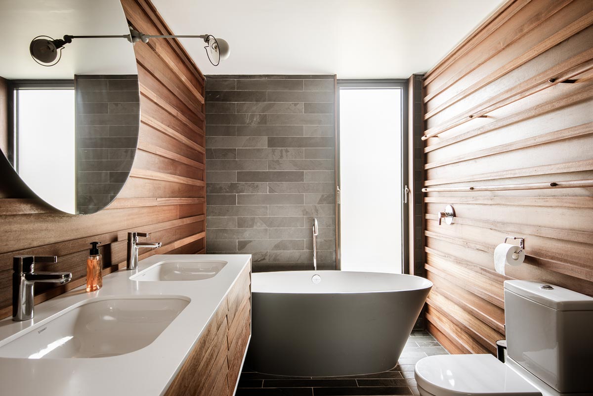 Tactile timber and tile lined bathroom